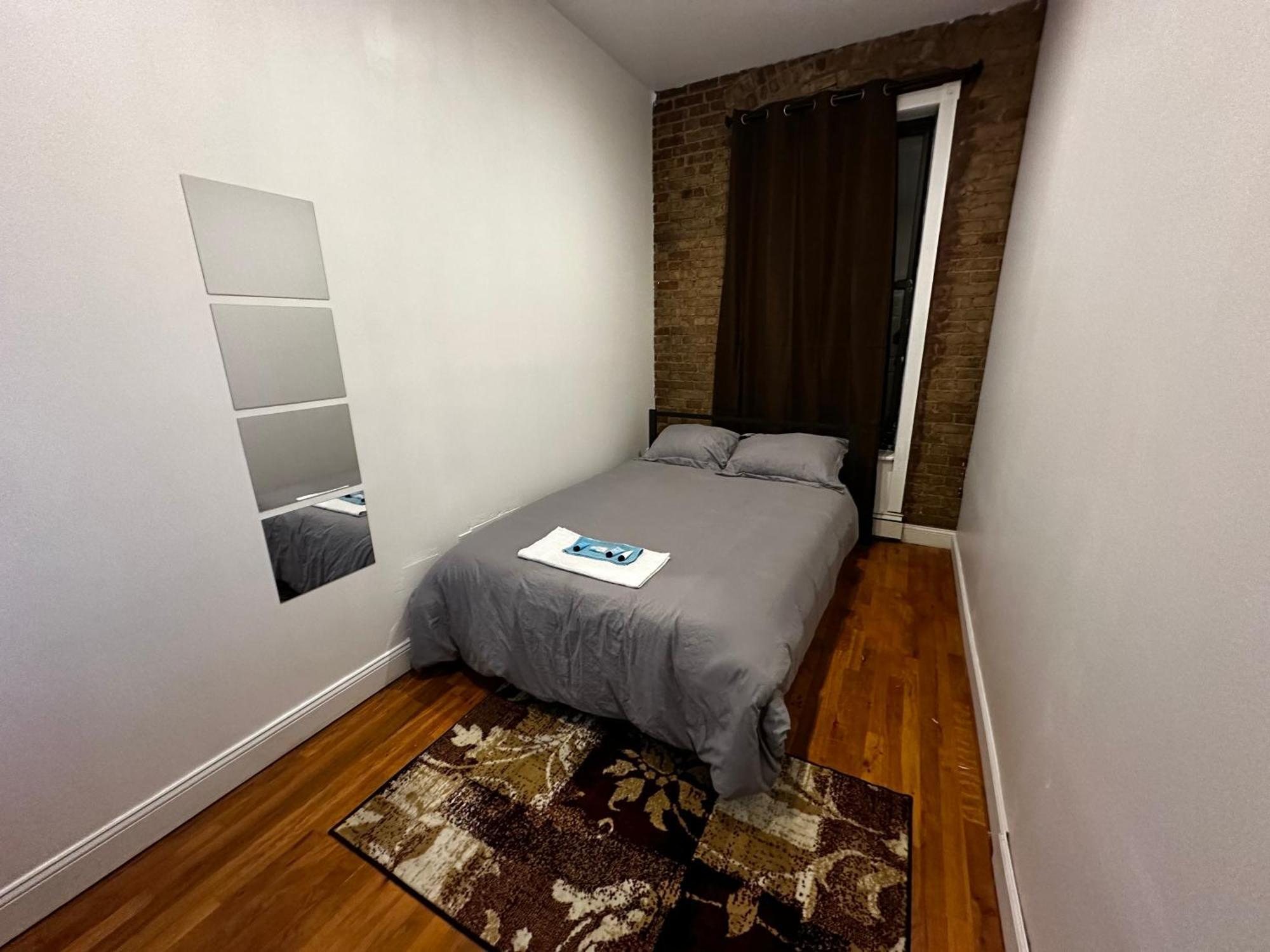 Cozy Townhouse In Harlem Apartment นิวยอร์ก ภายนอก รูปภาพ